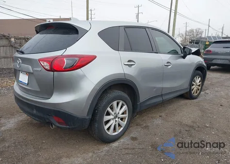 2013 Mazda Cx-5 Touring z USA, uszkodzony, nr VIN JM3KE2CE7D0120615